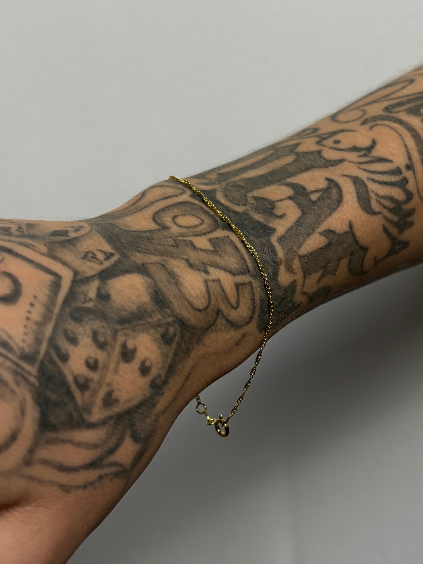 Pulseira Grumet Torcida | Banhado a Ouro 3 anos de garantia