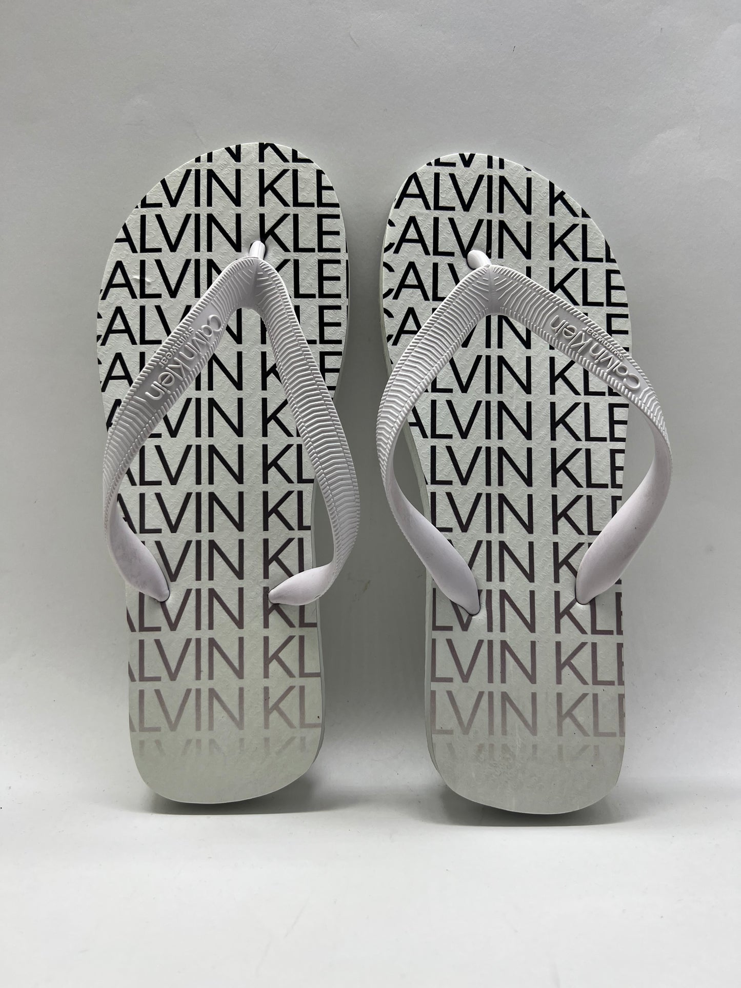 SANDÁLIA CK LETREIRO BRANCO