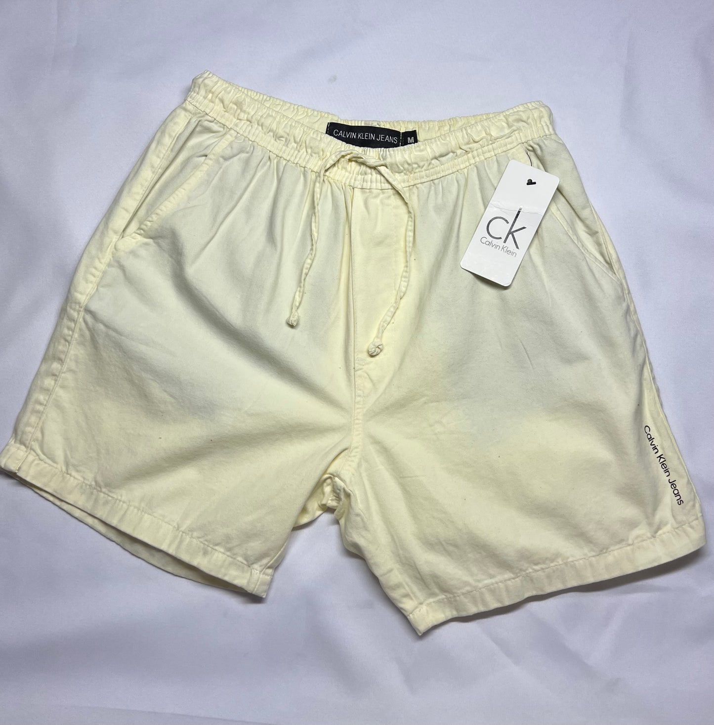 SHORT CASUAL CK AMARELO