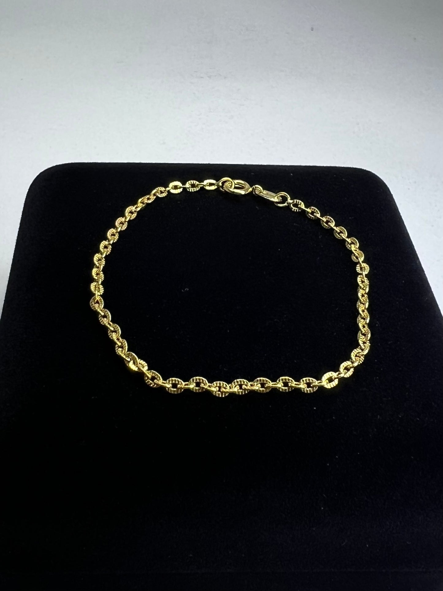 PULSEIRA BANHADA A OURO